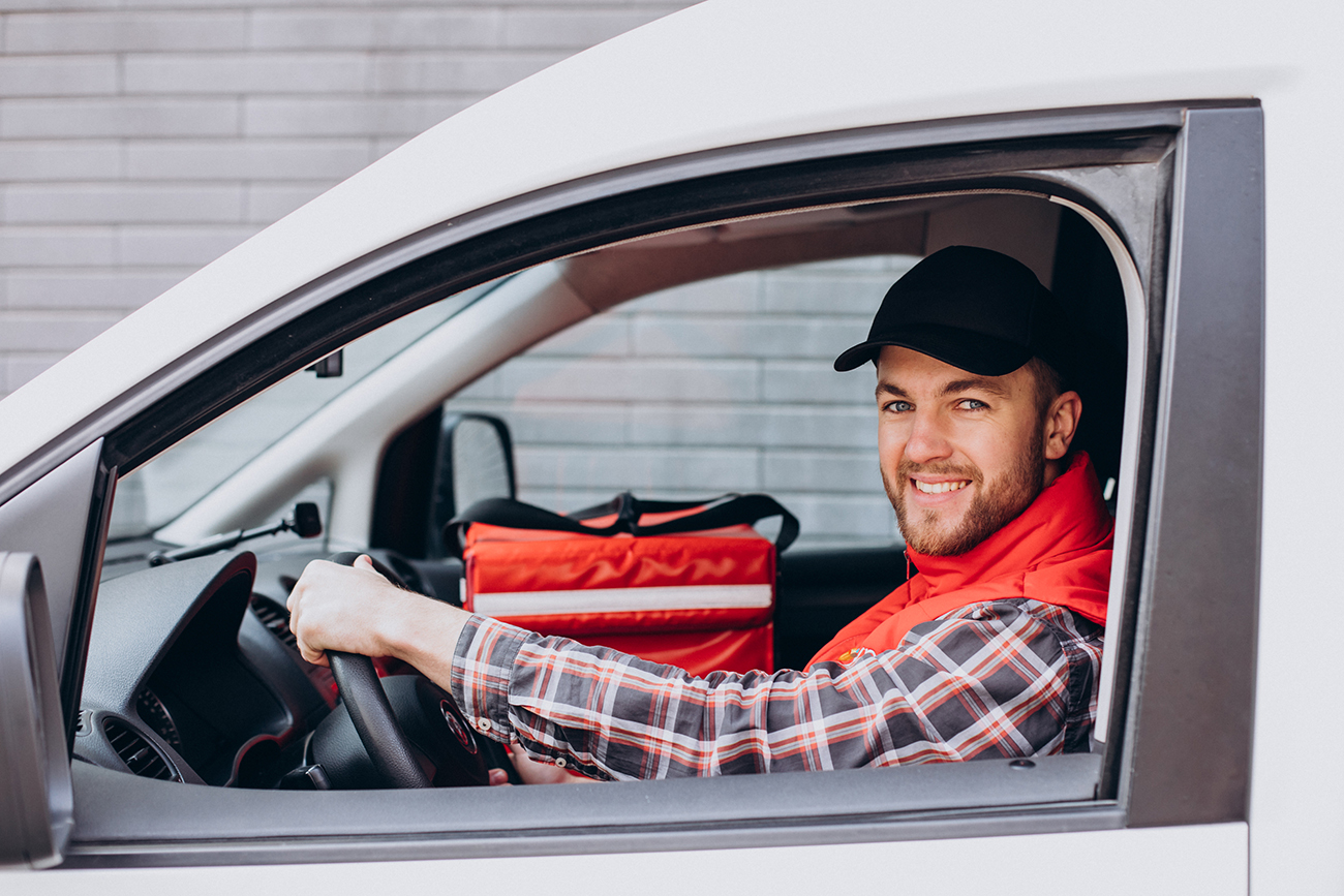 Food delivery man driving food box